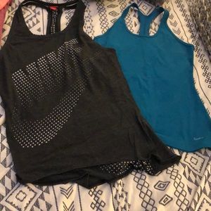 Two Nike tank tops